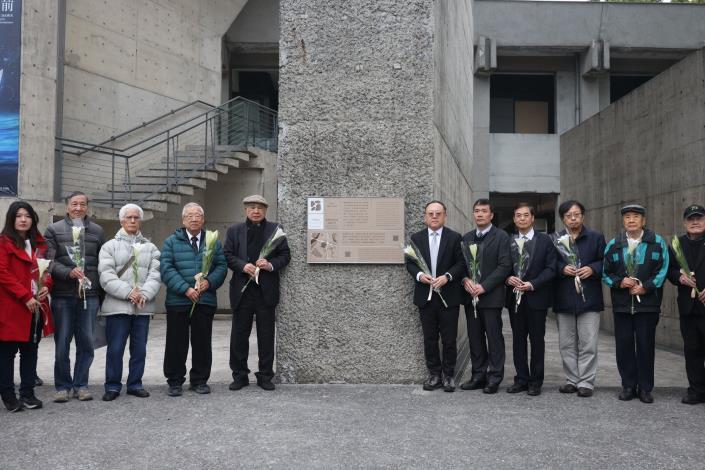 A group photo with the plaque at the Jing-Mei White Terror Memorial Park