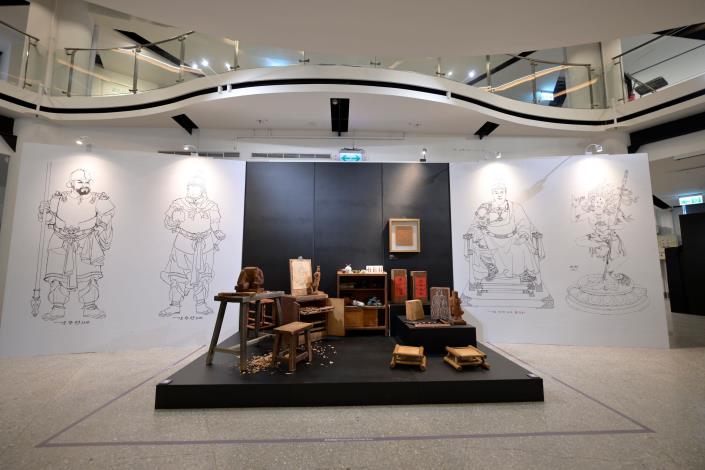 The exhibition showcases 66 selected wood carving works.