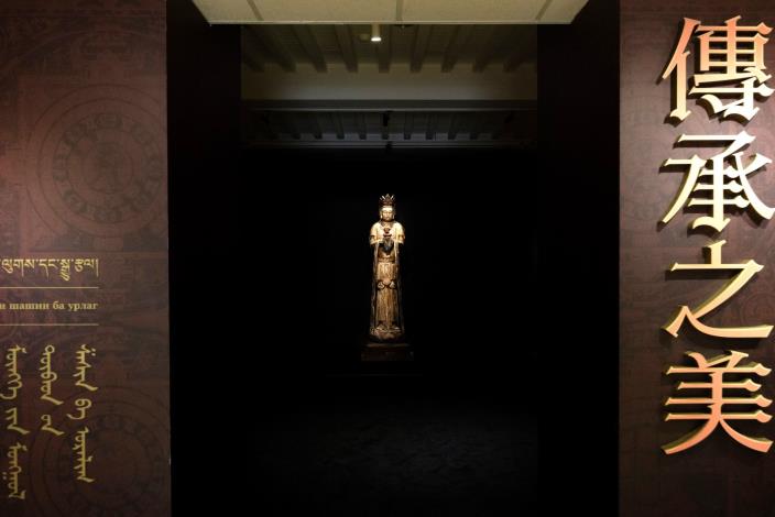 A Buddhist statue is placed at the exhibition's entrance