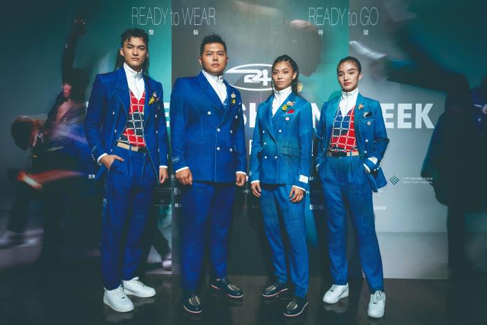 圖中間二人為臺灣射擊好手楊昆弼與拳擊國手吳詩儀，站在模特兒中間也超有架式。（JUST IN XX 提供）