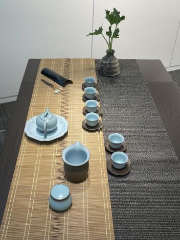 A tea table display designed by artist Huang Shu-man, and tea wares by Su Bau-tsai