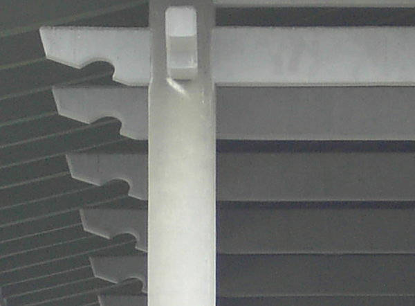 The straight stylish beams at the top of the building.jpg