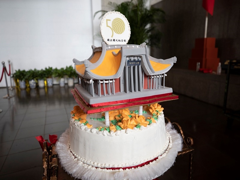 The style cake of the hall building is specially made for celebration.