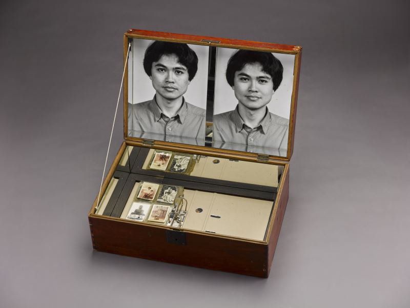 CHEN Shun-Chu	Family Black Box—Autobiography	 1992
Photo, photo frame, acrylic sheet, paint, cotton thread, wood, file folder, album leaflet, mirror, old wooden box, wax, Chinese medicine, acrylic paint, newspaper64 × 39 × 23 cm 
Collection of the National Taiwan Museum of Fine Arts